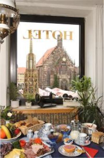 Tiptop Hotel Am Schoenen Brunnen 纽伦堡 餐厅 照片